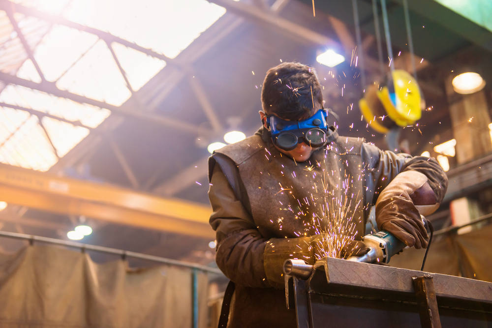 Man welding with welding googles