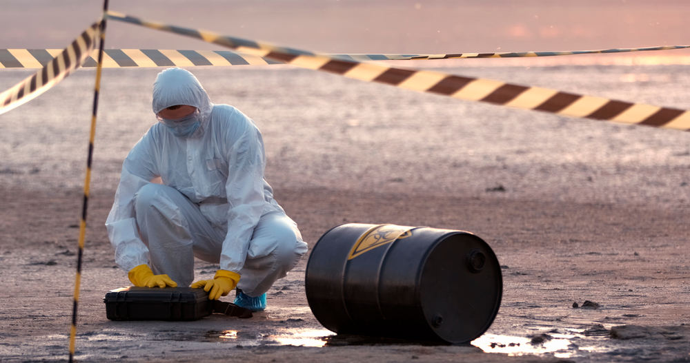 Person Cleaning Up Chemical Spill - 4 Tips for Preventing Chemical Spills in the Workplace